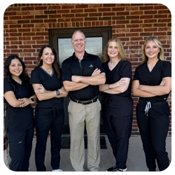 Chiropractic Clinic Team Standing Outside Office Building